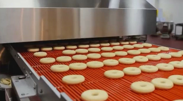 산업 반죽 시트를 까는 해결책을 가진 기계를 만드는 자동적인 도넛